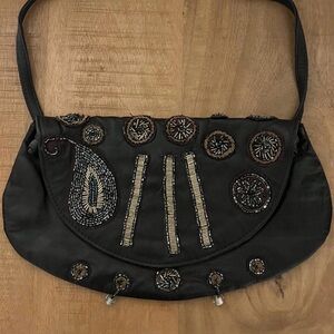 Vintage United Colors of Benetton leather shoulder bag.